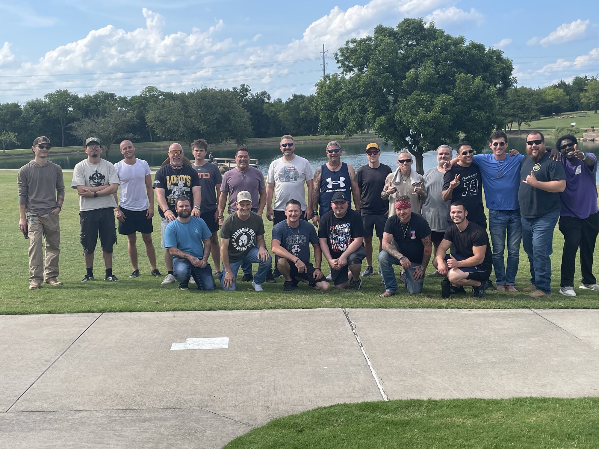 The early days — a group of men gathered on a field for prayer and fellowship